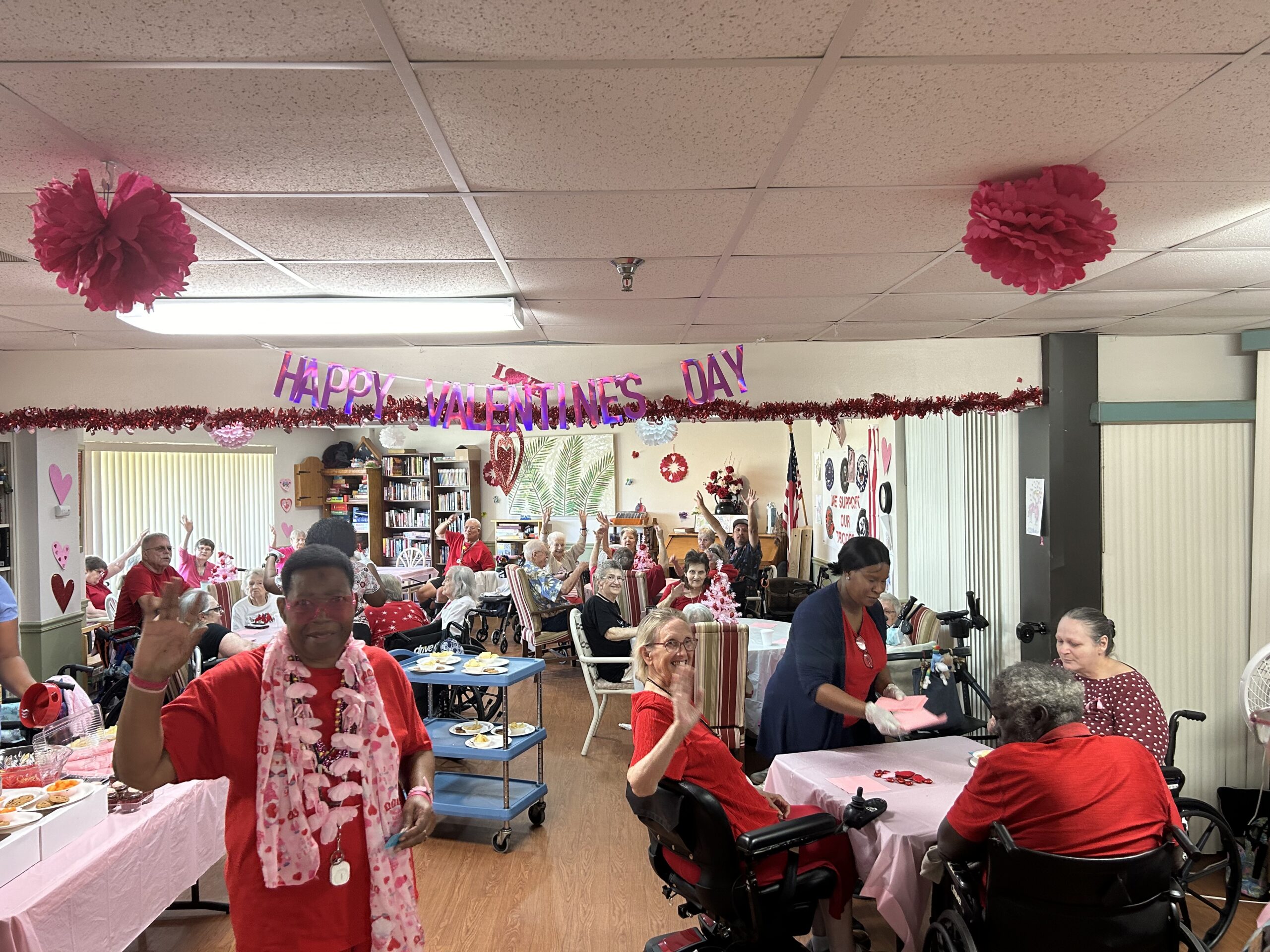 happy residents from arcadia florida on valentines day event at the assisted living facility